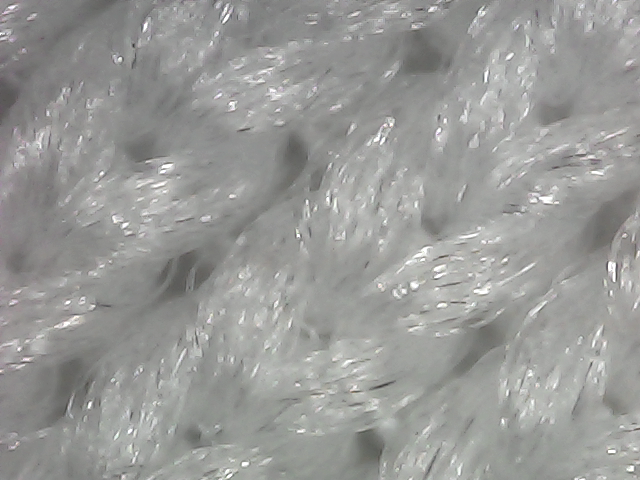 Unbonded textile outer layer — surface view
